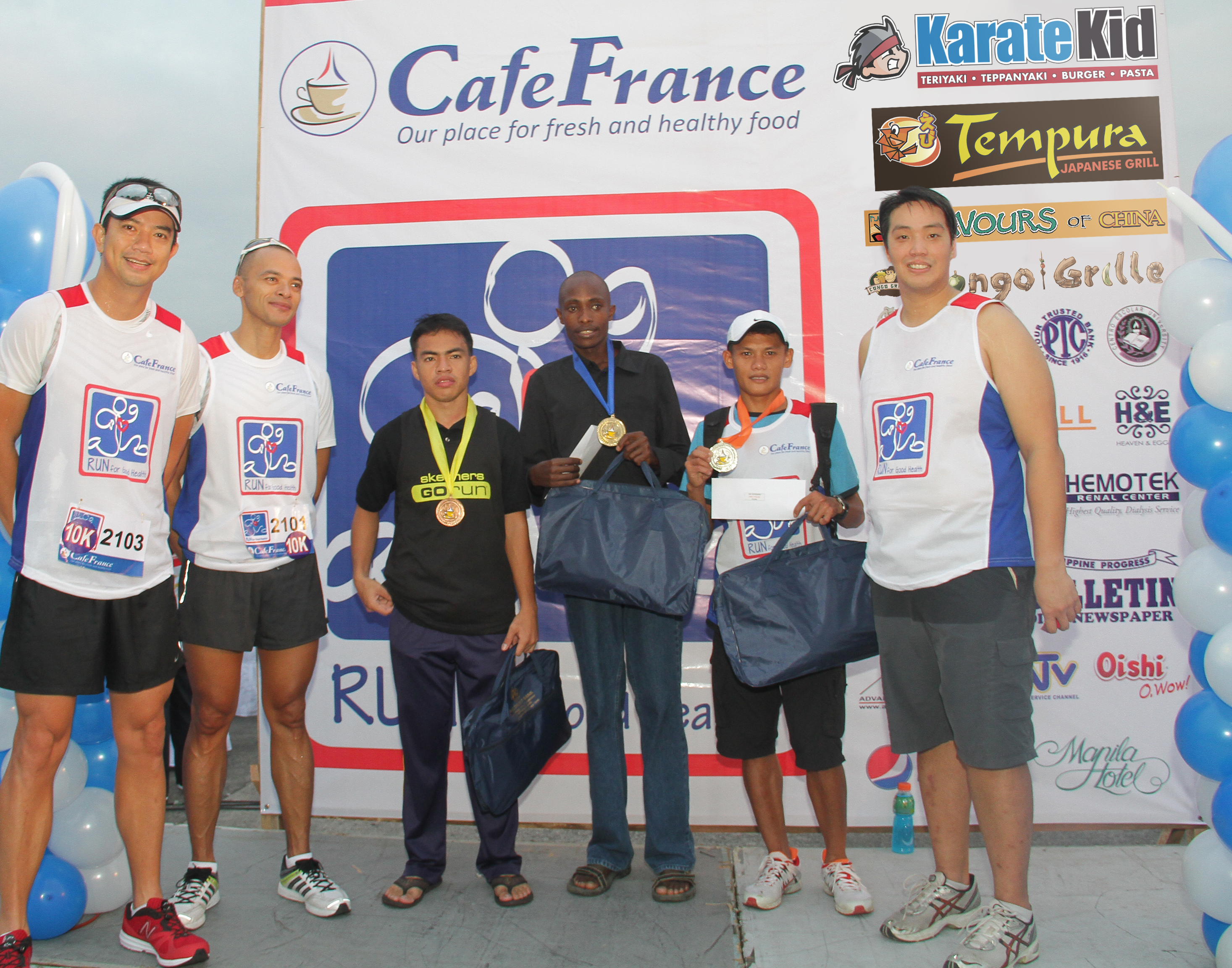 In the photo are Ivan Mayrina, Paolo Abrera, 10K first placer Willy Rotich (4th from left), Karate Kid Japanese Fastfood Vice-Chairman Raymond Yap together with the other placers.