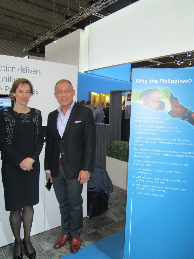 Globe President and CEO Ernest L. Cu with Anne Bouverot, Director General and Member of the Board of GSMA at the Globe m-Education booth, GSMA Mobile World Congress in Barcelona, Spain
